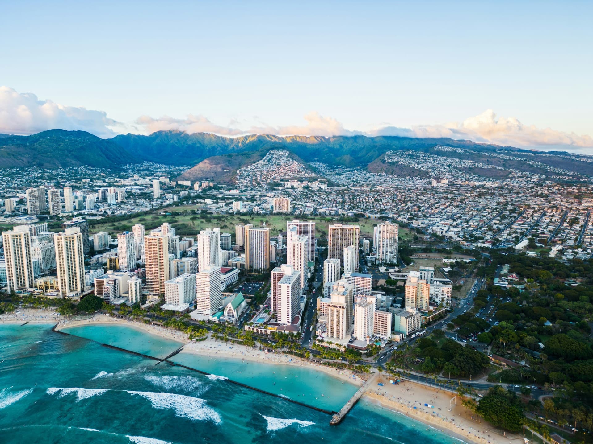 O'ahu coastline at golden hour — the island environment that responsible debris disposal helps protect — Alpha Omega Plumbing