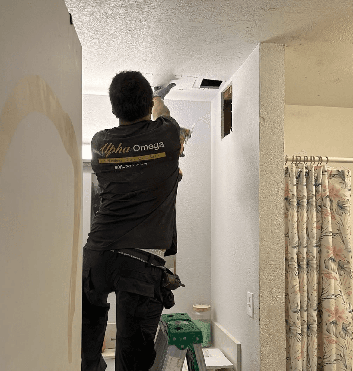 Licensed Alpha Omega Plumbing technician replacing interior pipe runs in a Honolulu home
